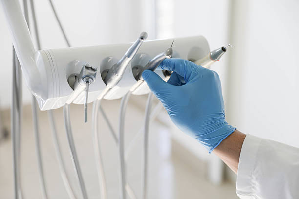 Professional Root Canal Treatment technician working in Seco Mines, TX